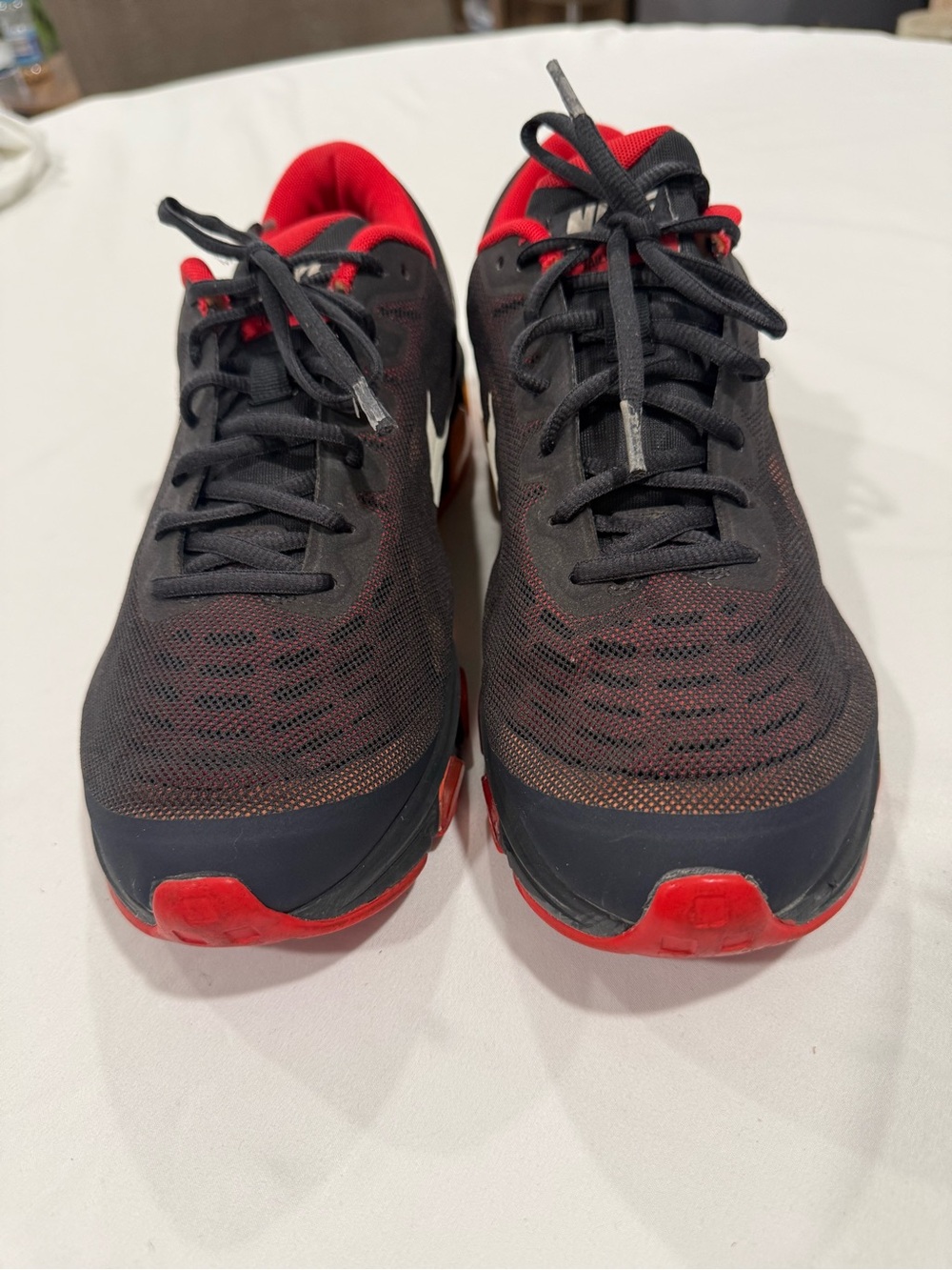 Nike Black Running Shoes with Red Collar and Orange Insole